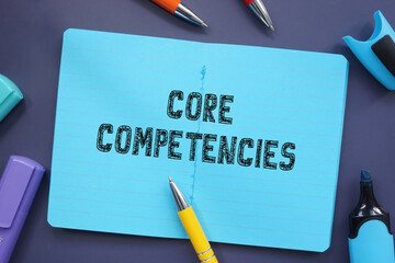 Financial concept about Core Competencies with inscription on the piece of paper.