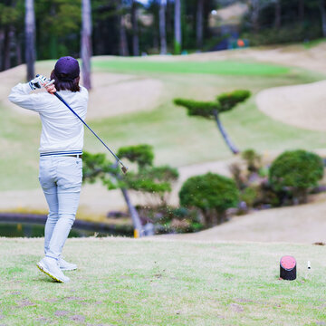 Japanese senior woman play golf