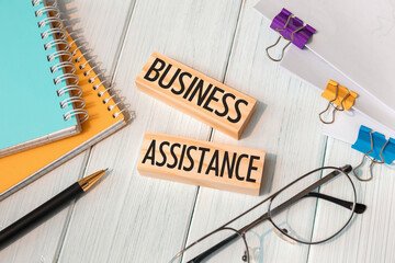 Business Assistance - words written on wooden blocks