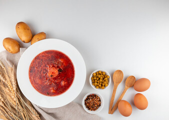 Ukrainian borscht soup and ingredients, empty space for text