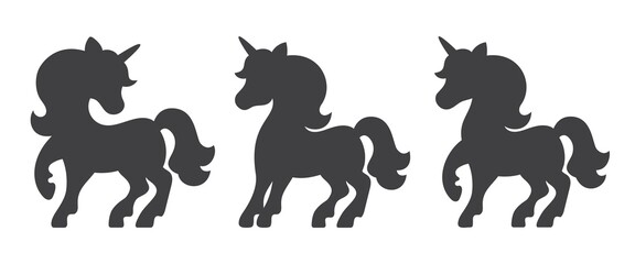 Silhouettes of unicorns vector set. Three different shapes isolated on white background.