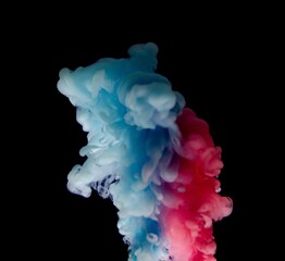 Multi-colored paints in water. Ink swirls underwater. A cloud of collision of bright ink on a black background. Colorful abstract explosion of smoke. Abstract background