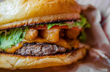 Street food. Meat cutlet burgers are in paper boxes. Food delivery.