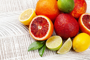 Fototapeta na wymiar Various fresh citrus fruits