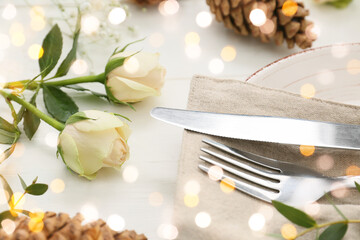 Beautiful table setting on white wooden background