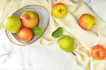 Tasty apple and pear fruits on white background
