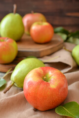 Naklejka na ściany i meble Tasty apple and pear fruits on table
