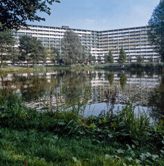 Fototapeta na wymiar Park and residential flat Bijlmermeer Amsterdam 1990. Apartments. Residential area. Urbanisation. Before the Bijlmer air disaster. Bijlmer vliegramp. El-Al plane crash.