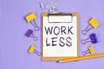 The words Work Less written on a white notebook. Work and study concept