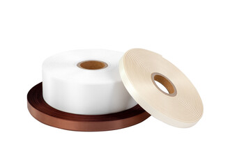 three reels of satin ribbon for labels or sewing in white, dark brown and beige, isolated without shadows on a white background.
