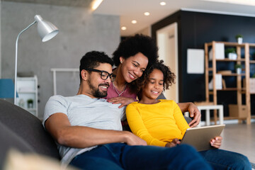 Black family studying and learning from home for online school during coronavirus