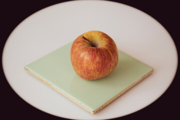 Apple, healthy and dietary fruit displayed on a kitchen table