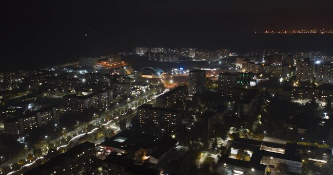 Motion lapse of modern energetic town with a lot of dynamic. Bright lights of the night