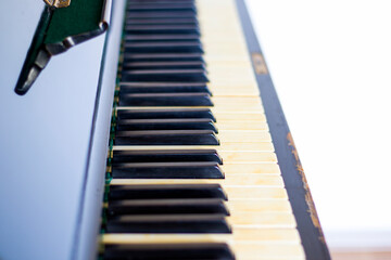 Piano keyboard, black and white key, close-up and macro, retro and vintage piano