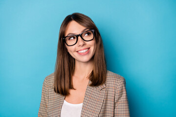 Portrait of brunette optimistic lady look empty space wear spectacles brown blazer isolated on...