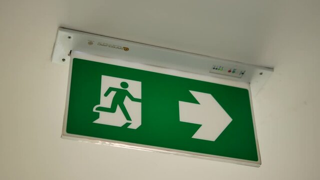Close Up Footage of Fire Exit Signboard
