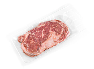 Marbled beef steak. Vacuum packed. View from above. White background. Isolated.