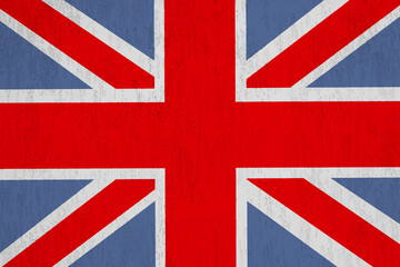 Fototapeta premium Flag of the United Kingdom painted onto a grunge brick wall