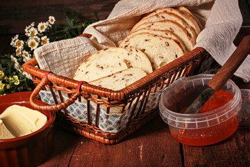 Freshly baked wheat-rye bread from alternative flour with seeds and grain cut into pieces, lying on the kitchen Board. Homemade cake. The fermentation process. Slow baking.