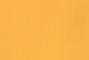 Yellow coloured creative uncoated paper background. Extra large highly detailed image.