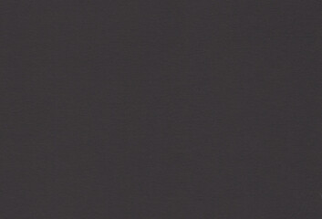 Black coloured creative uncoated paper background. Extra large highly detailed image.
