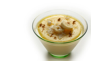 Milk and banana pudding. With coconut and cinnamon.