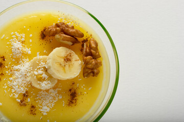 Milk and banana pudding. With coconut and cinnamon.