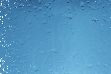 wet glass background condensate / abstract rain, drops texture on transparent glass
