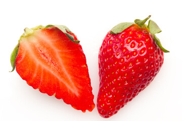 Two strawberries close up on white background