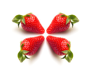 Two strawberries close up on white background