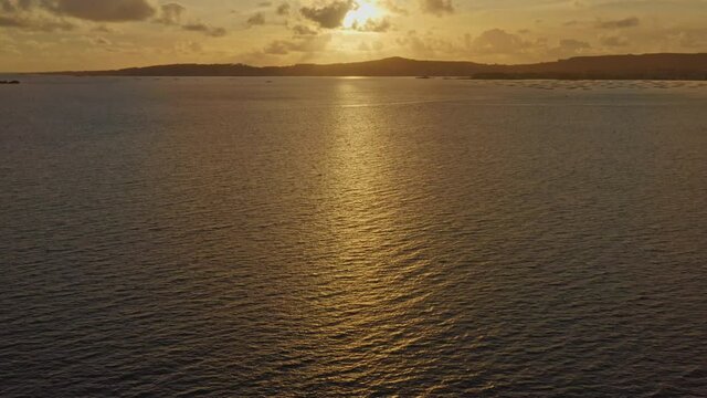 Sunset over the sea Drone aerial shot over the water