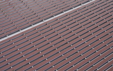 The exterior of the building - planks with LEDs, background with outdoor elements