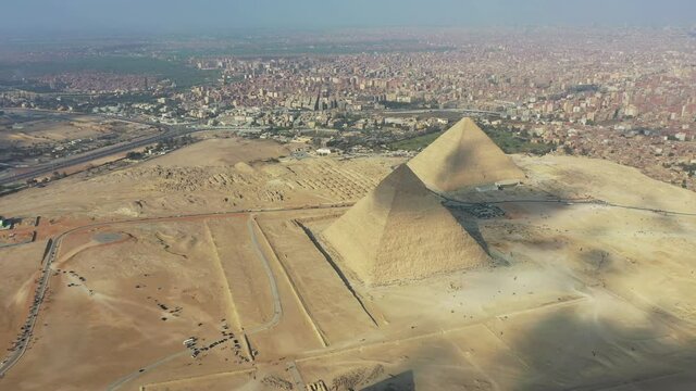 Aerial Drone shot of Pyramids and the city of Cairo, Egypt panning to the right