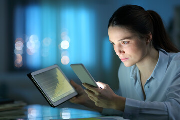 Self employed working with multiple devices in the night