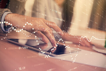 Double exposure of data theme hologram drawing and man and woman working together holding and using a mobile device.