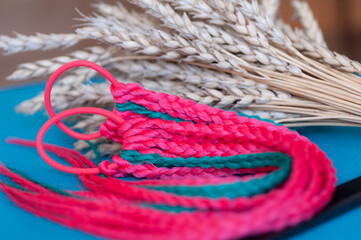 Hair accessory elastic band with red braids