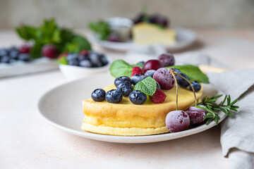 Vanilla no crust cheesecake or cottage cheese casserole decorated with mint and berries. Ricotta casserole. Healthy breakfast or dessert.