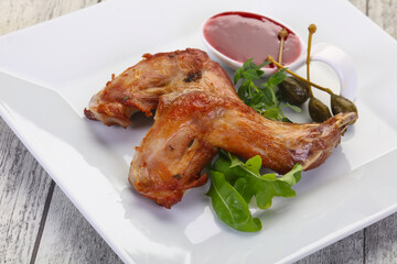 Roasted rabbit legs