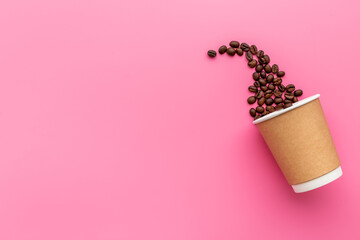 Paper cup with coffee beans. Coffee concept