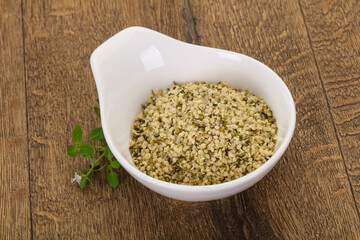 Peeled hemp seeds in the bowl
