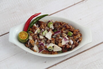 reshly cooked Filipino food called Pork Sisig