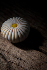 Nerikiri Wagashi Japanese Sweet on wooden table.