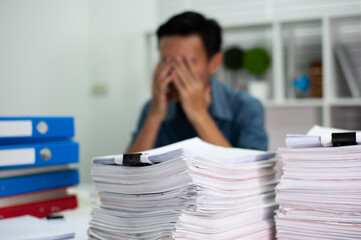 The young man is busy and has the stress of working hard.