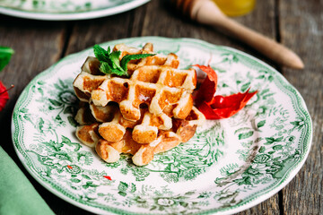 cottage cheese waffles with honey on a plate