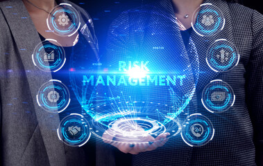 Business, Technology, Internet and network concept. Young businessman working on a virtual screen of the future and sees the inscription: Risk management