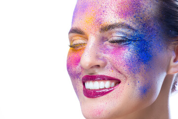 Beauty Ideas. Beauty Closeup Portrait of Tranquil Caucaisan Girl With Closed Eyes and Powder Colorful Artistic Makeup Across The Face On White.