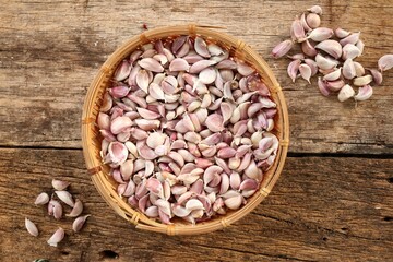 Garlic herb spice on table wood background