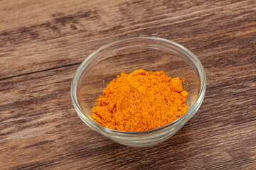 Tumeric powder in the bowl