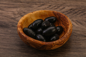 Pickled black olives in the bowl