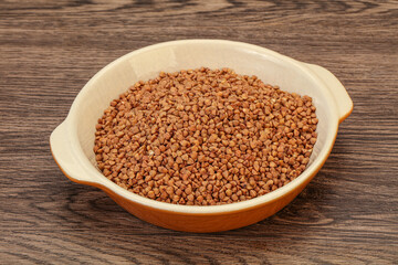 Raw buсkwheat cereal in the bowl